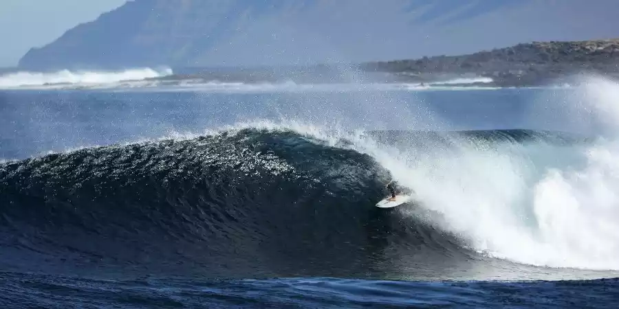 Surfing in Caleta de Caballo